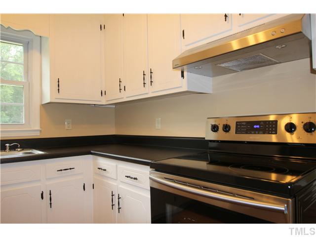 1685 Jack Road Clayton, NC 27520 - Photo 4 of 14 Completely updated kitchen with new stainless steel appliances, counter top and laminate flooring