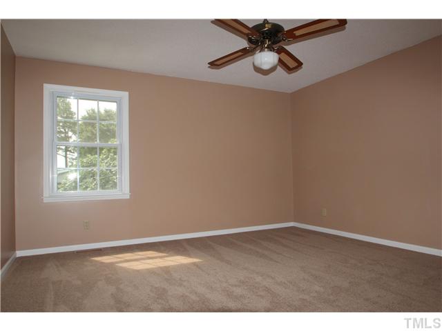 1685 Jack Road Clayton, NC 27520 - Photo 6 of 14 Master bedroom with new carpet, painted walls and ceiling fan