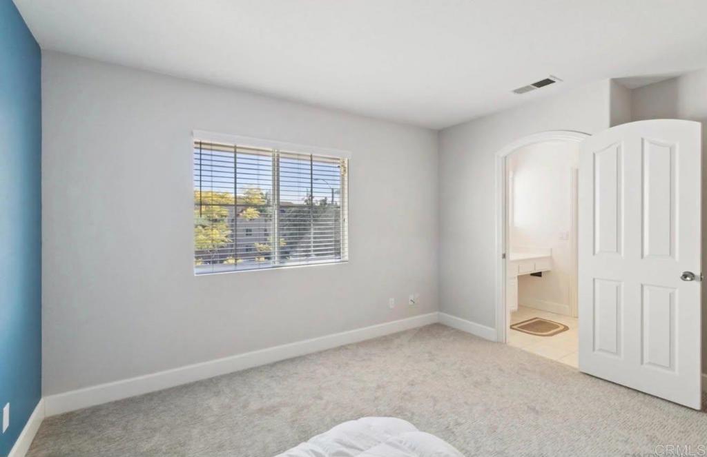 1234 Old Janal Ranch Road Chula Vista, CA 91915 - Photo 22 of 34 a view of an empty room with a window