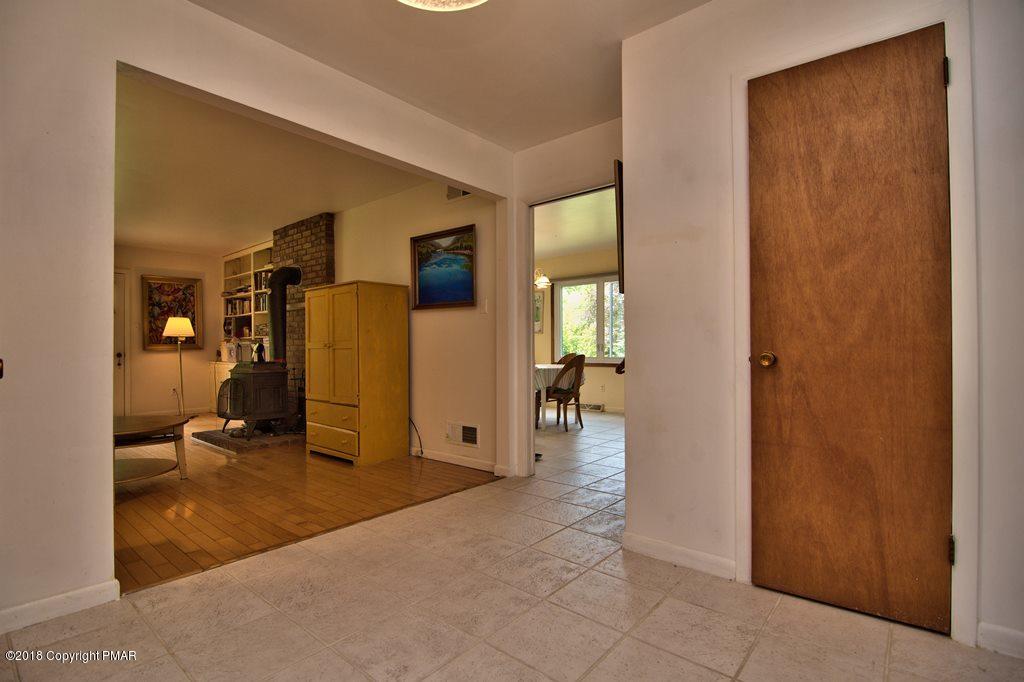 5208 Neola Road Stroudsburg, PA 18360 - Photo 13 of 56 Foyer View Into Kitchen & Living Room