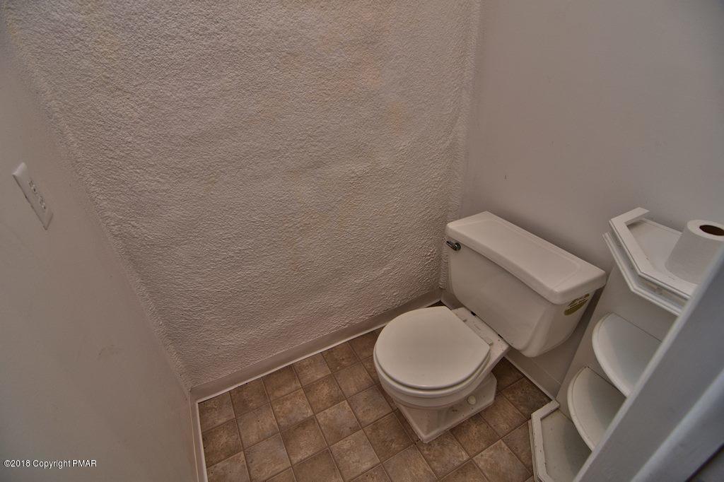 5208 Neola Road Stroudsburg, PA 18360 - Photo 40 of 56 Lower Level Half Bath