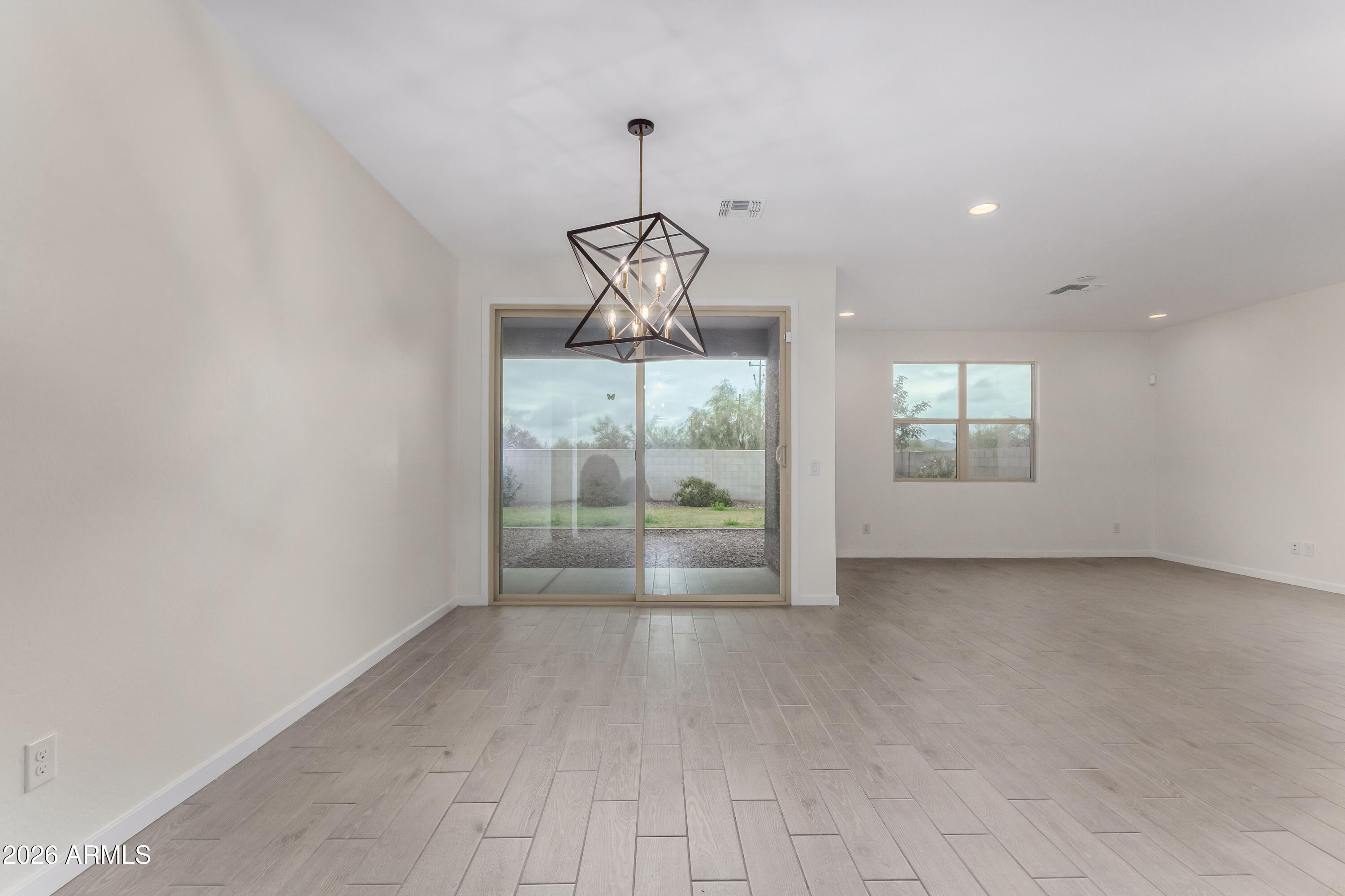 17352 West Red Fox Road Surprise, AZ 85387 - Photo 12 of 45 a view of empty room with window