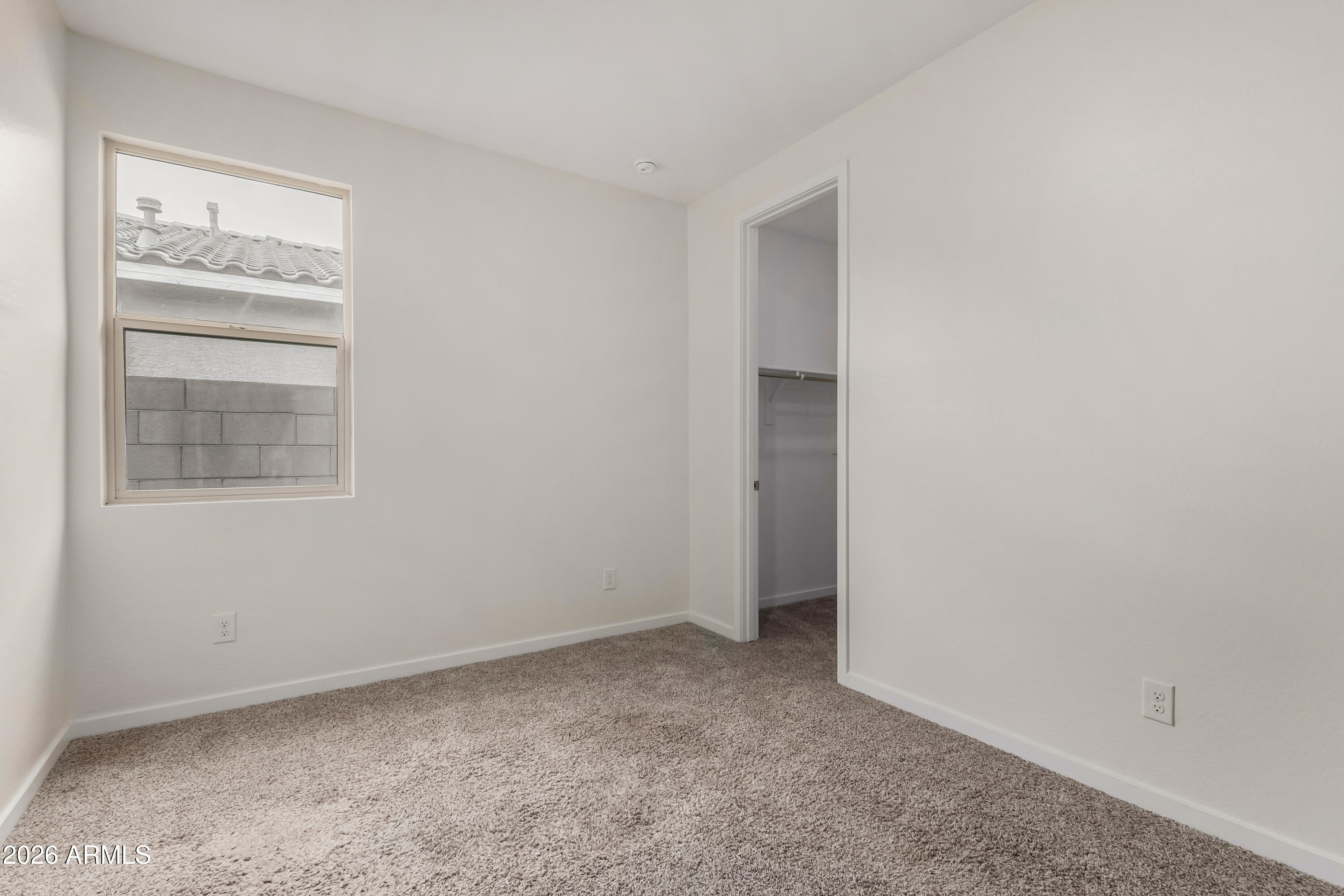 17352 West Red Fox Road Surprise, AZ 85387 - Photo 28 of 45 a view of an empty room