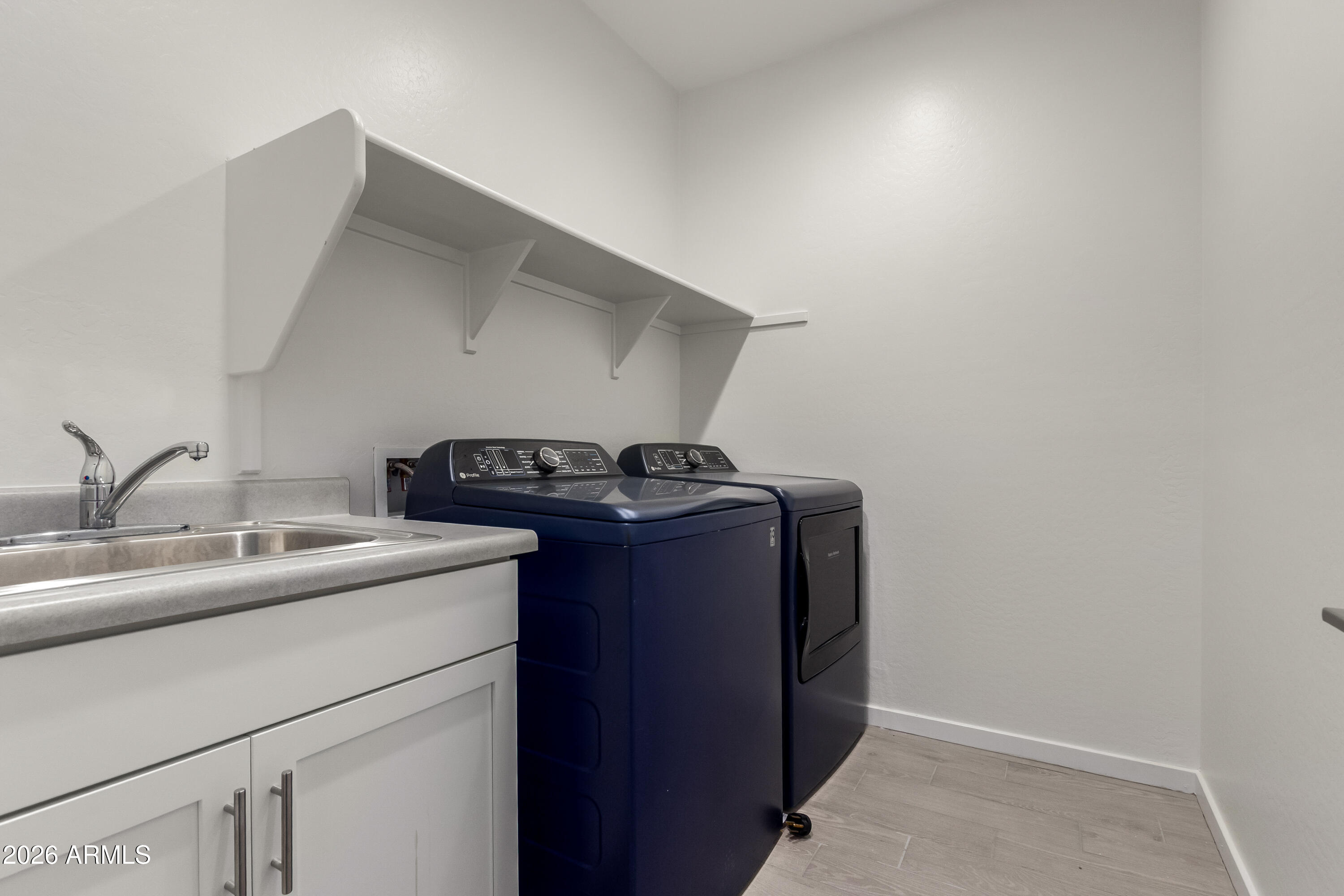 17352 West Red Fox Road Surprise, AZ 85387 - Photo 37 of 45 a utility room with dryer and washer