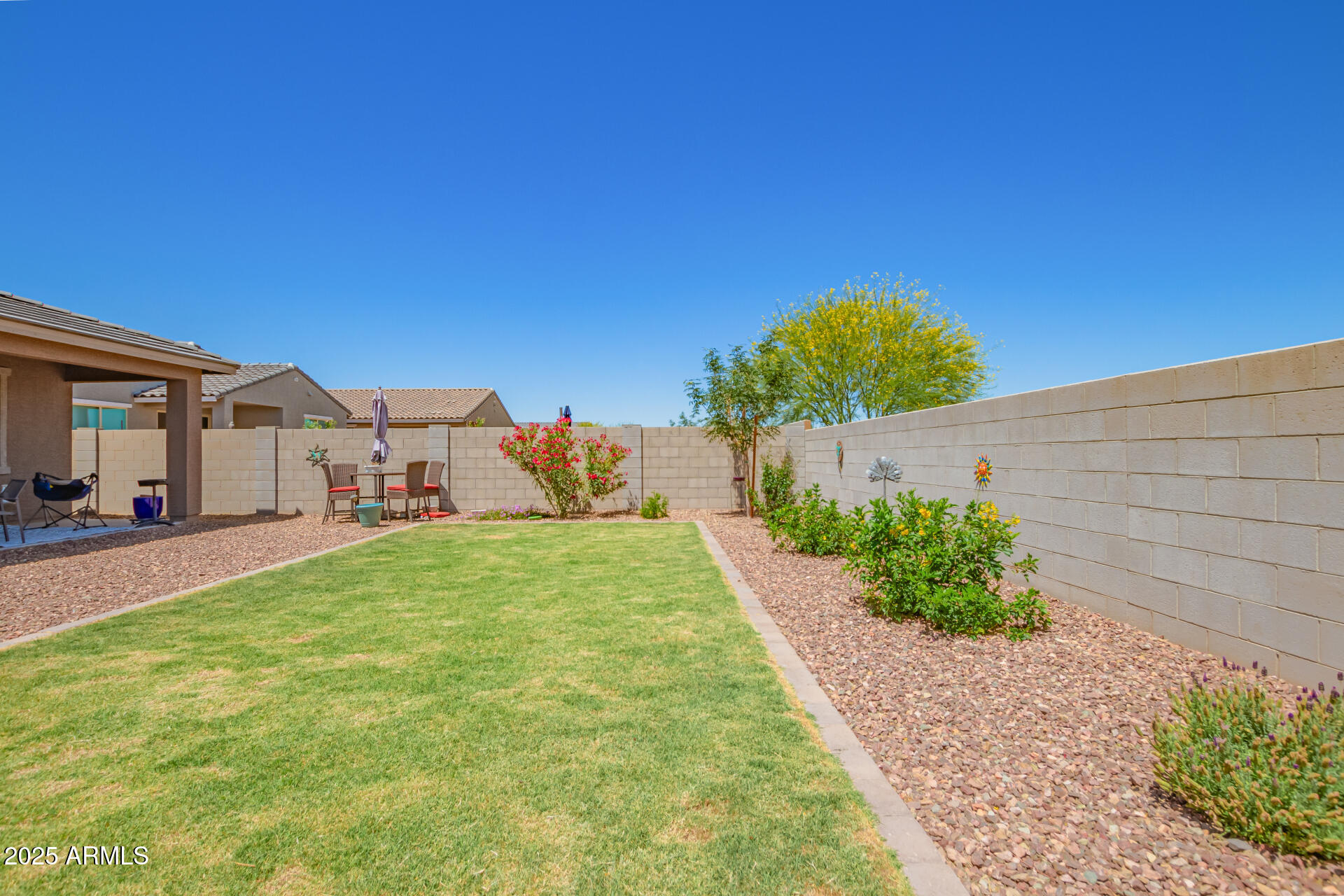 17352 West Red Fox Road Surprise, AZ 85387 - Photo 41 of 45 a front view of a house with a yard and garage