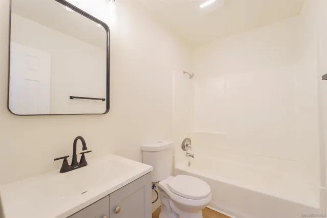 a view of kitchen with wooden floor