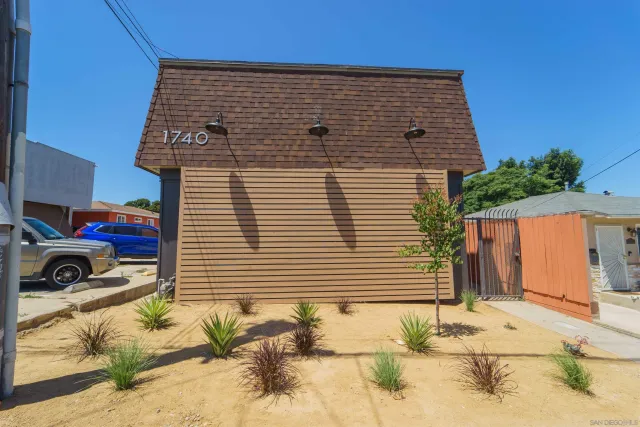 a car parked in front of a house