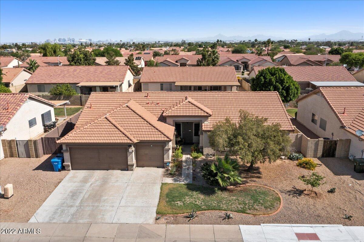 1836 East Darrel Road Phoenix, AZ 85042 - Photo 1 of 28 an aerial view of a house with a garden