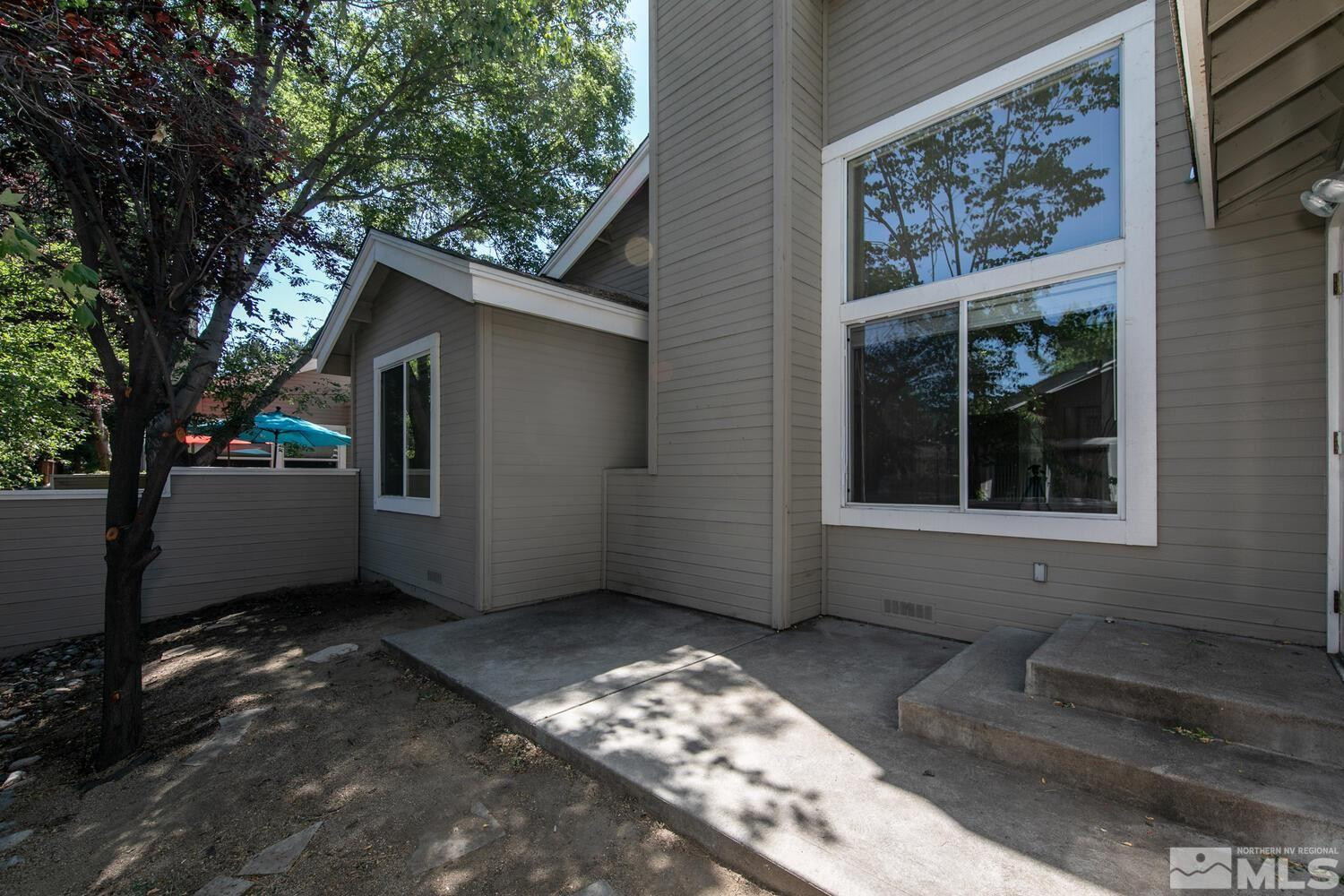 3335 Spring Creek Circle Reno, NV 89509 - Photo 26 of 30 a view of a house with a yard