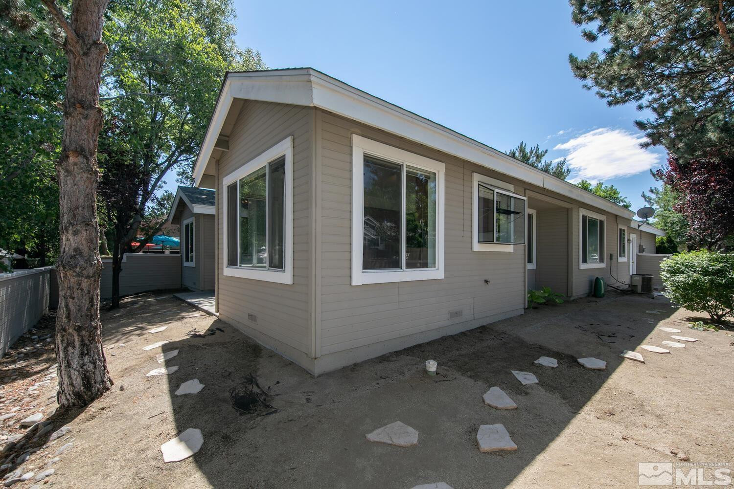 3335 Spring Creek Circle Reno, NV 89509 - Photo 27 of 30 a front view of a house with windows