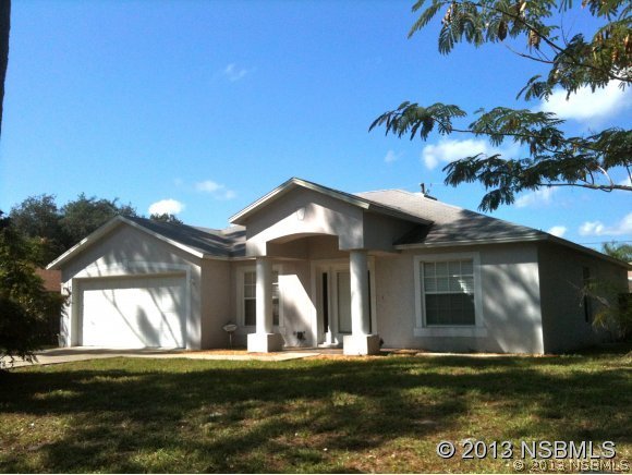 3004 Royal Palm Drive Edgewater, FL 32141 - Photo 1 of 1 a view of a house with a yard