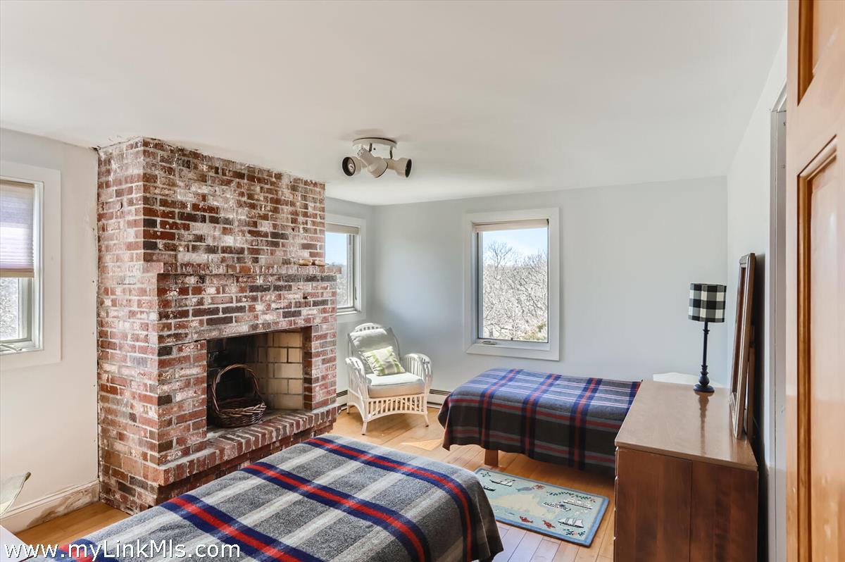 654 Lighthouse Road Aquinnah, MA 02535 - Photo 18 of 29 Guest room with fireplace