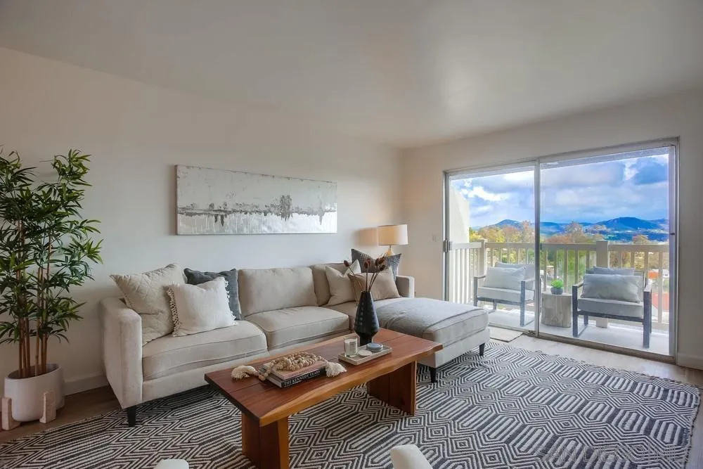 1870 Forestdale Drive Encinitas, CA 92024 - Photo 3 of 19 a living room with furniture and a floor to ceiling window
