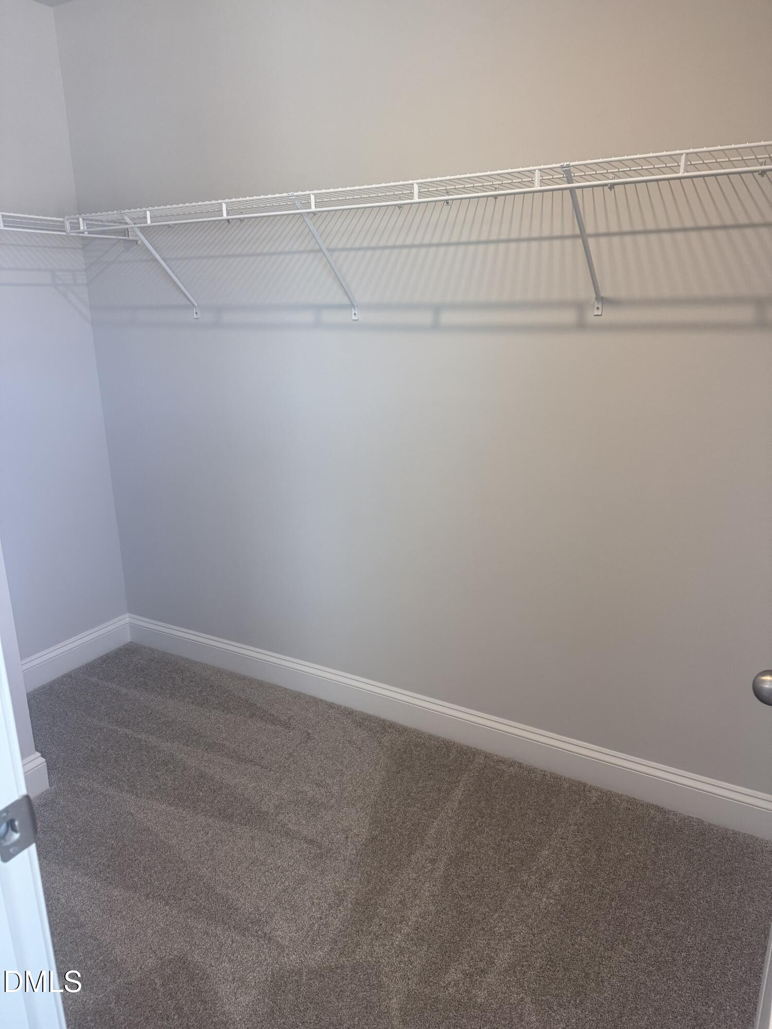 1920 Fishamble Street Fuquay-Varina, NC 27526 - Photo 15 of 23 a view of an empty walk in closet