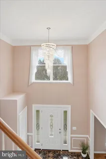a view of a livingroom with furniture and window