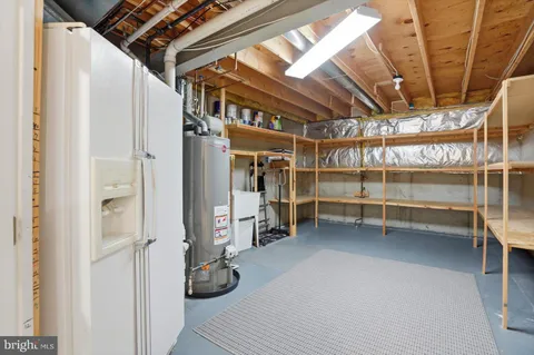 a view of room with racks on the wall