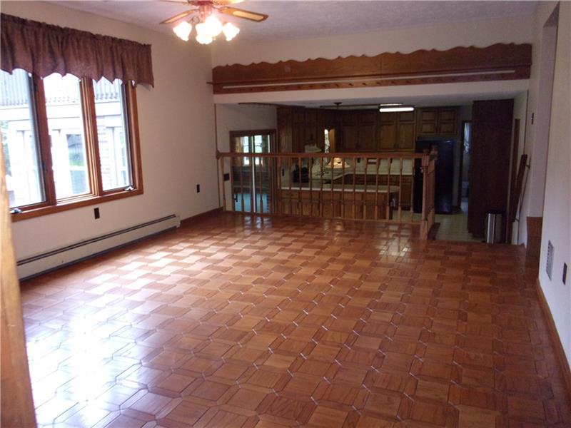 210 Jones Road Valencia, PA 16059 - Photo 3 of 25 Spacious and bright Dining Room with oak parquet flooring and huge bright bay window that looks out to back yard