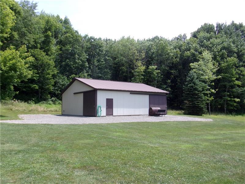 210 Jones Road Valencia, PA 16059 - Photo 23 of 25 Pole Building with electric & water. Floor has been left unfinished so it is possible to use to house horses.