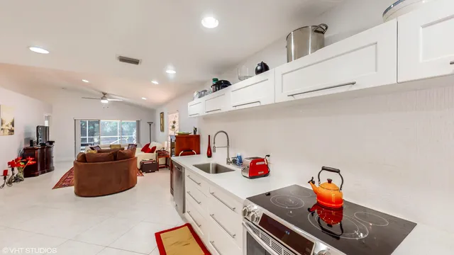 a bedroom with a bed and dresser