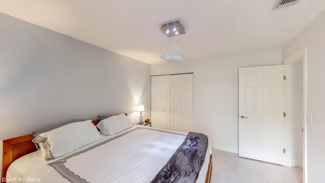 a bath room with a toilet and a bath tub