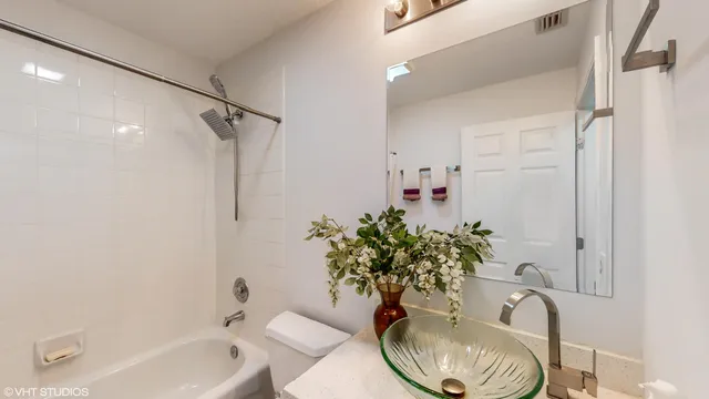 a view of a livingroom with furniture and a window