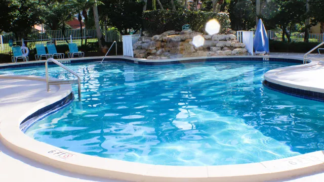 a view of swimming pool with a patio