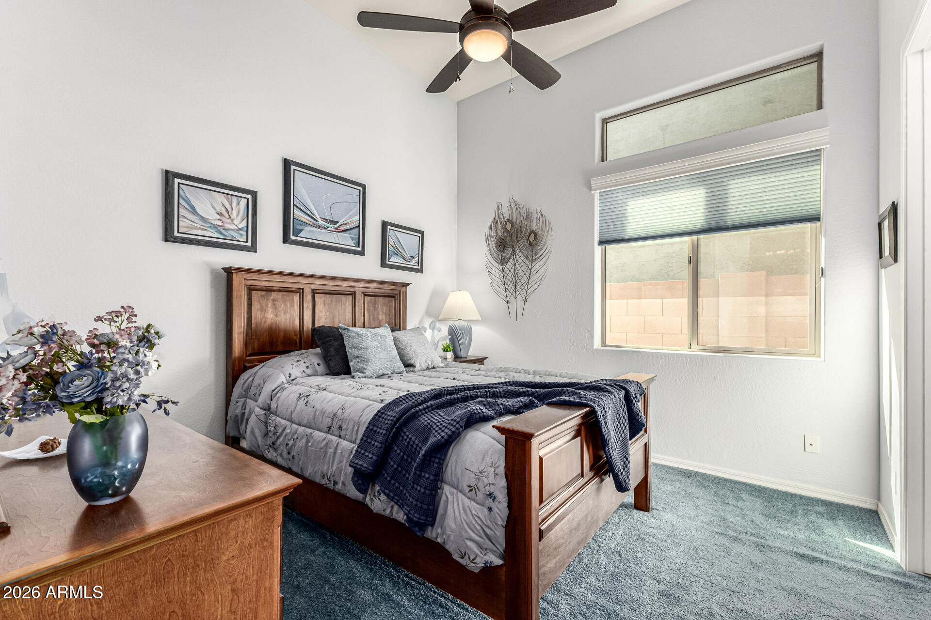 17926 West Griswold Road Waddell, AZ 85355 - Photo 31 of 73 a bedroom with bed and window