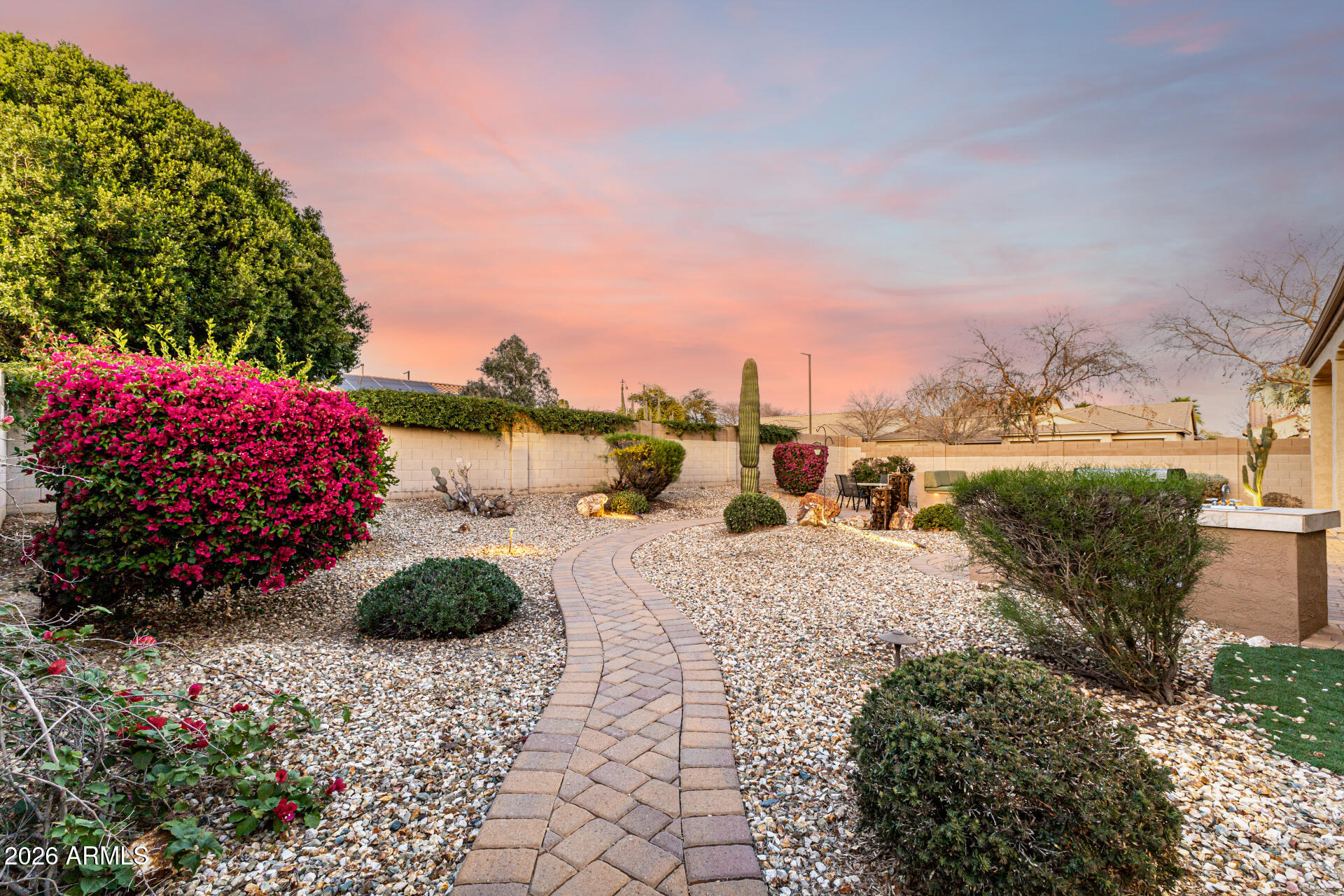 17926 West Griswold Road Waddell, AZ 85355 - Photo 45 of 73 a view of a pathway with a garden