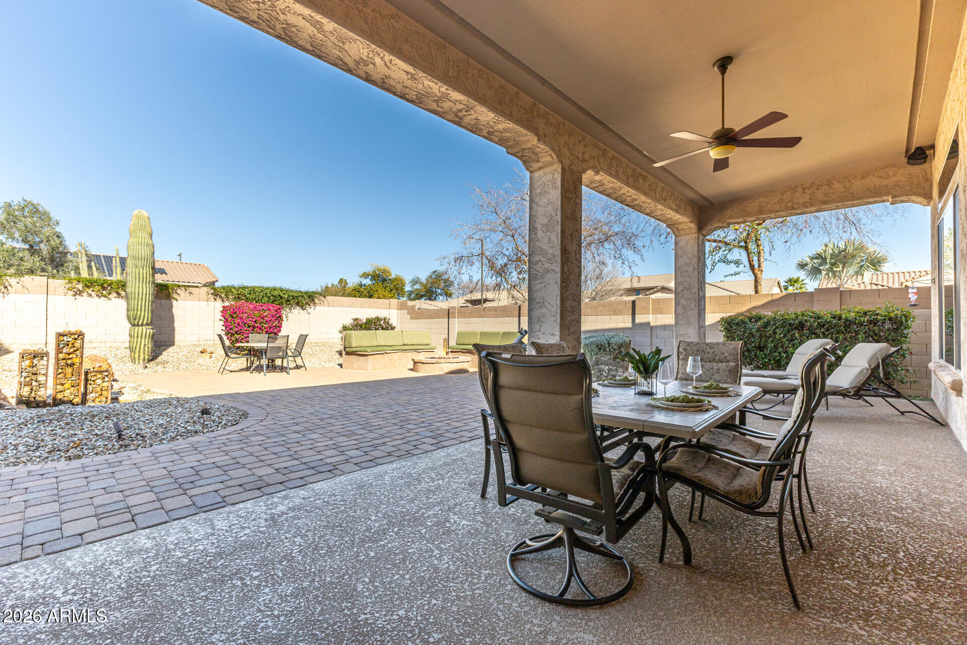 17926 West Griswold Road Waddell, AZ 85355 - Photo 46 of 73 a view of a dining room with furniture window and outside view