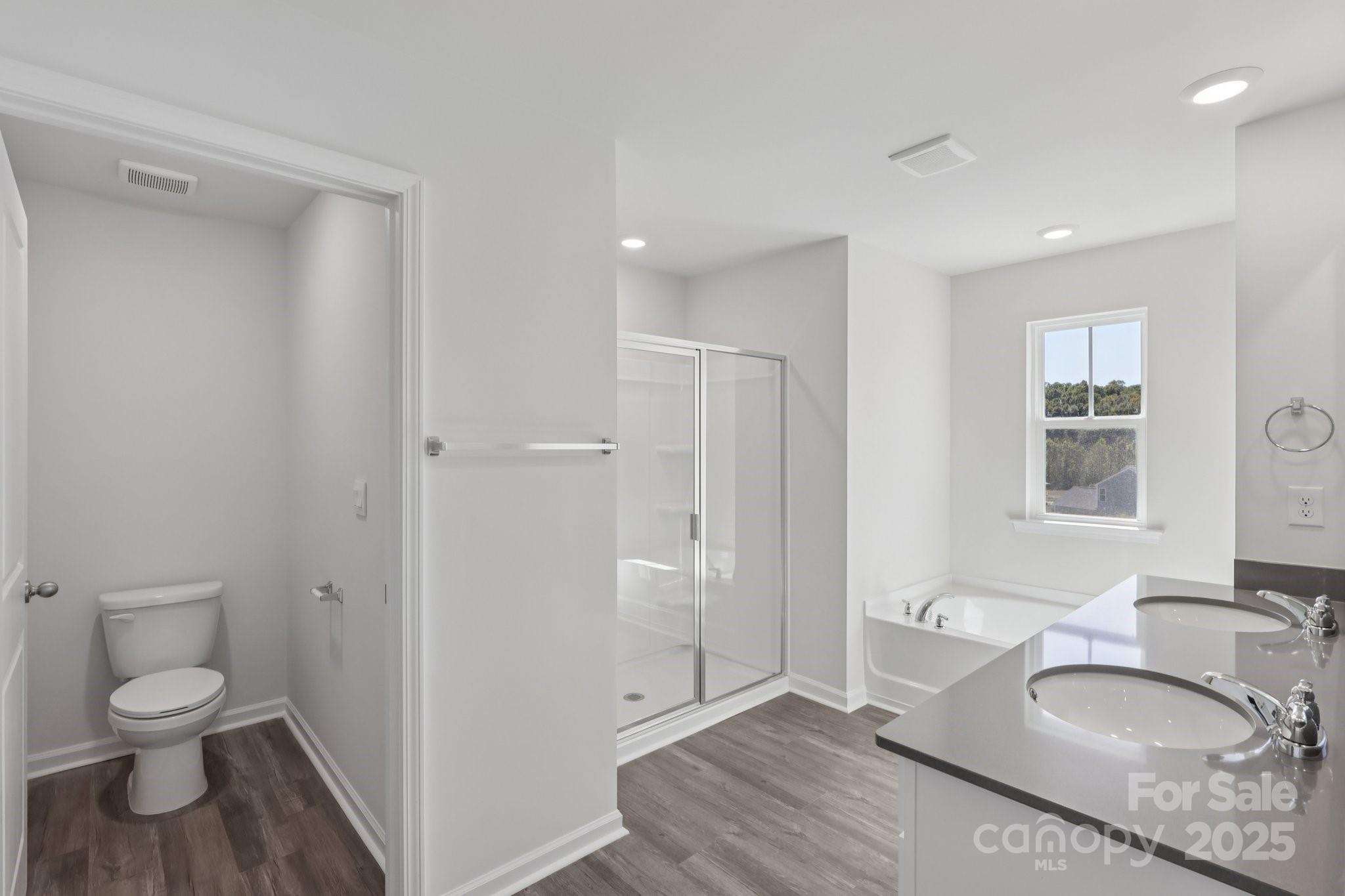 3964 Ashton Drive Northwest Conover, NC 28613 - Photo 23 of 44 a bathroom with a granite countertop sink toilet and shower