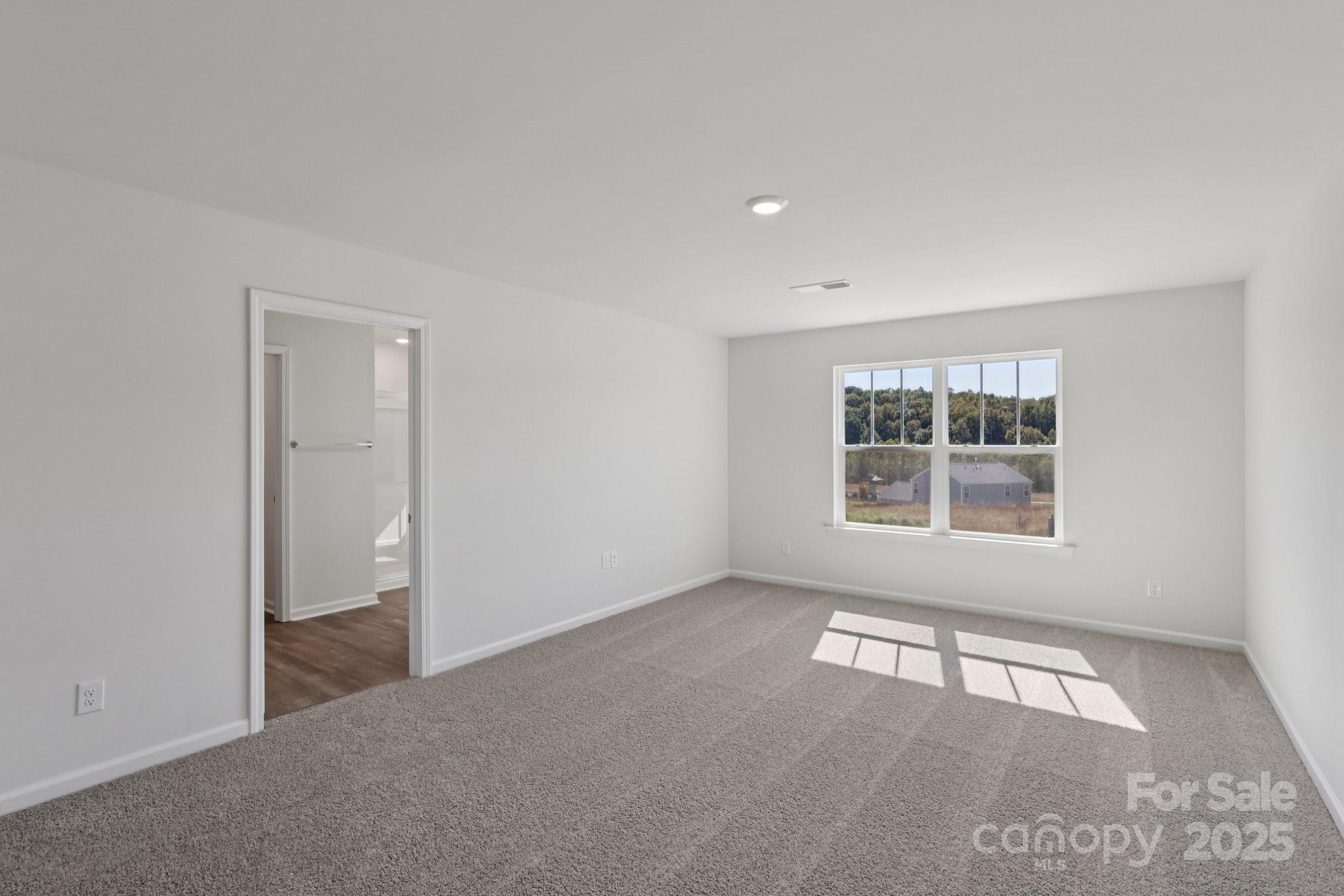 3964 Ashton Drive Northwest Conover, NC 28613 - Photo 26 of 44 a view of an empty room with a window
