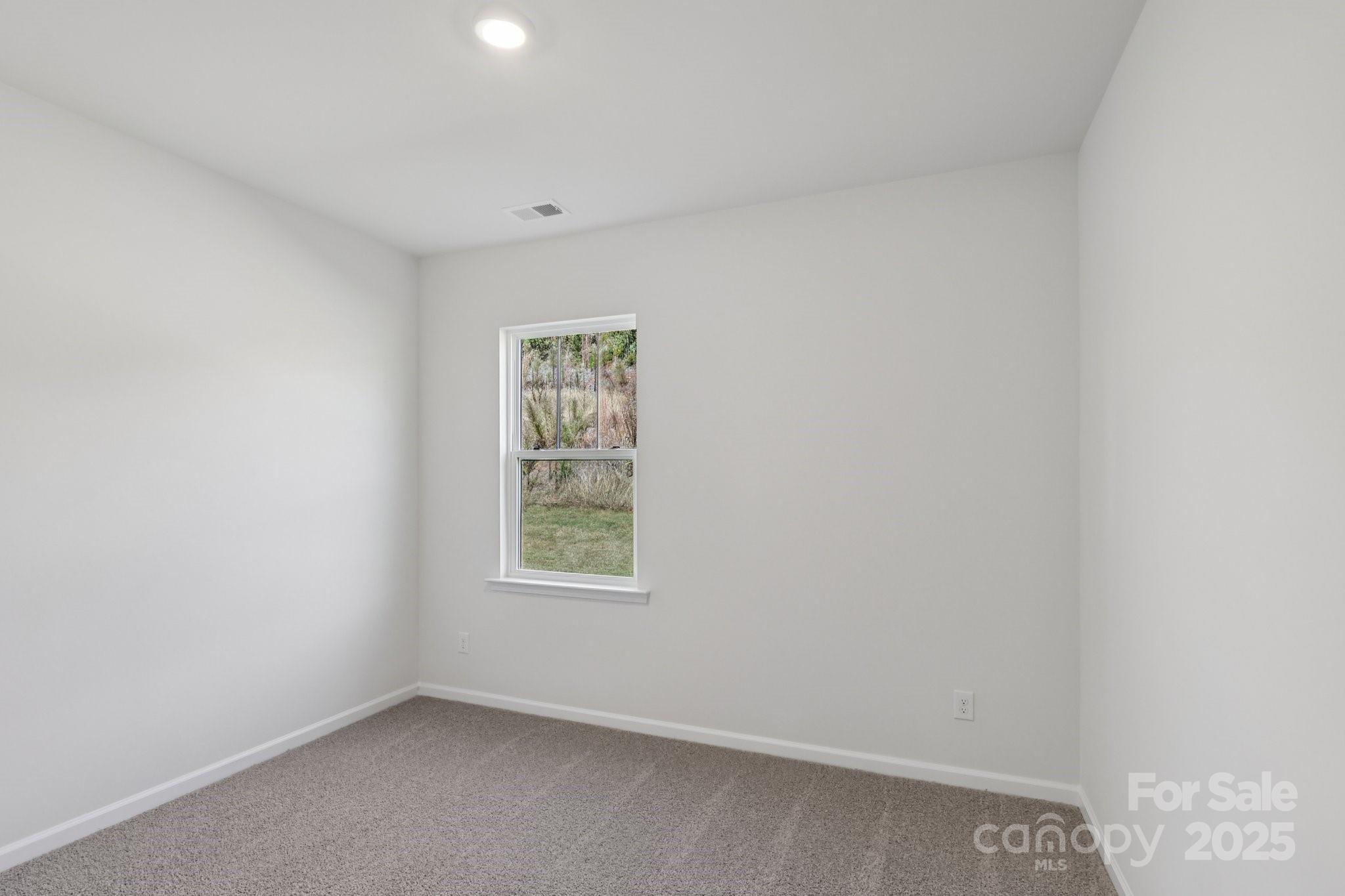 3964 Ashton Drive Northwest Conover, NC 28613 - Photo 27 of 44 an empty room with a window