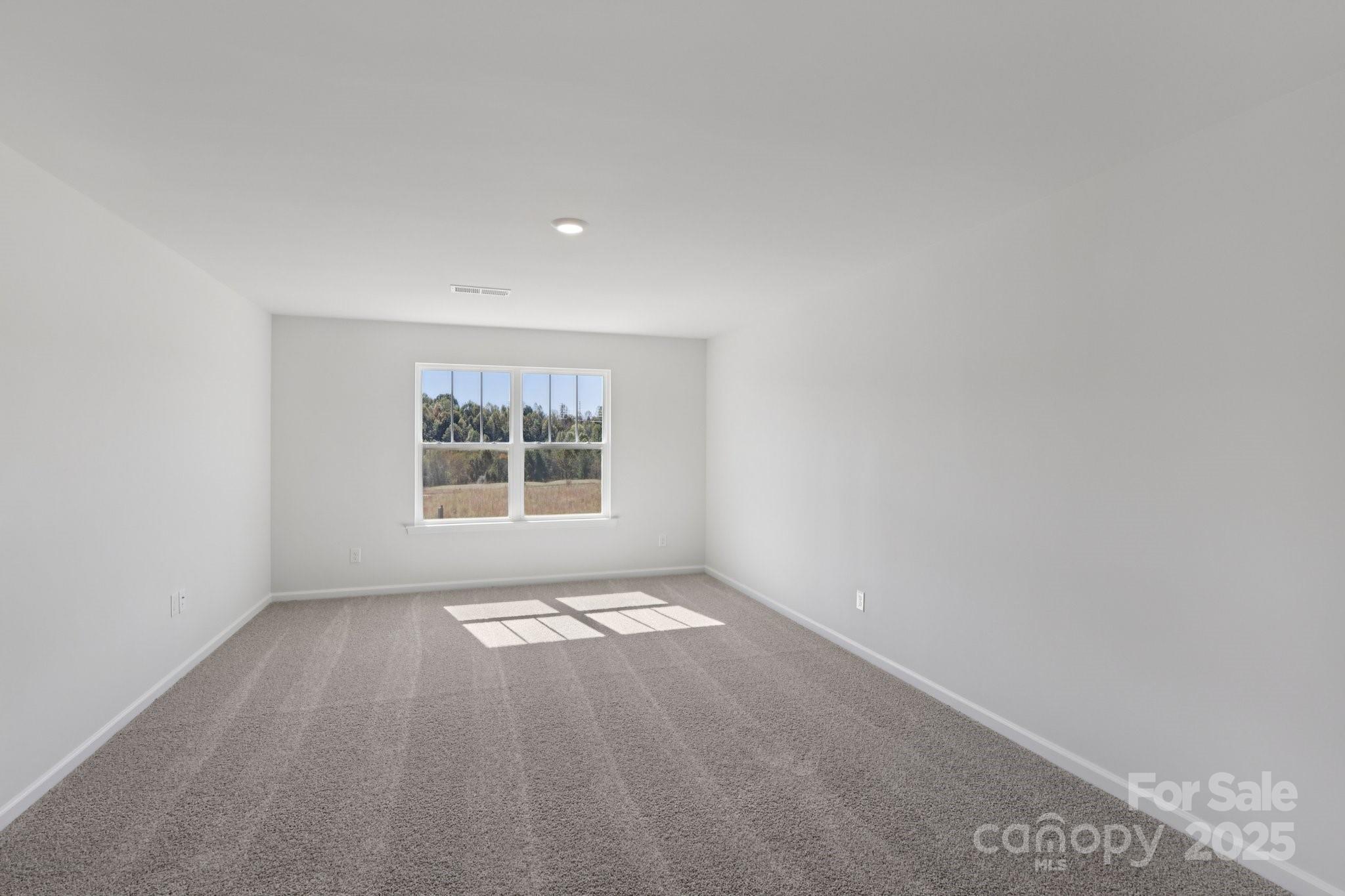 3964 Ashton Drive Northwest Conover, NC 28613 - Photo 30 of 44 a view of an empty room with a window