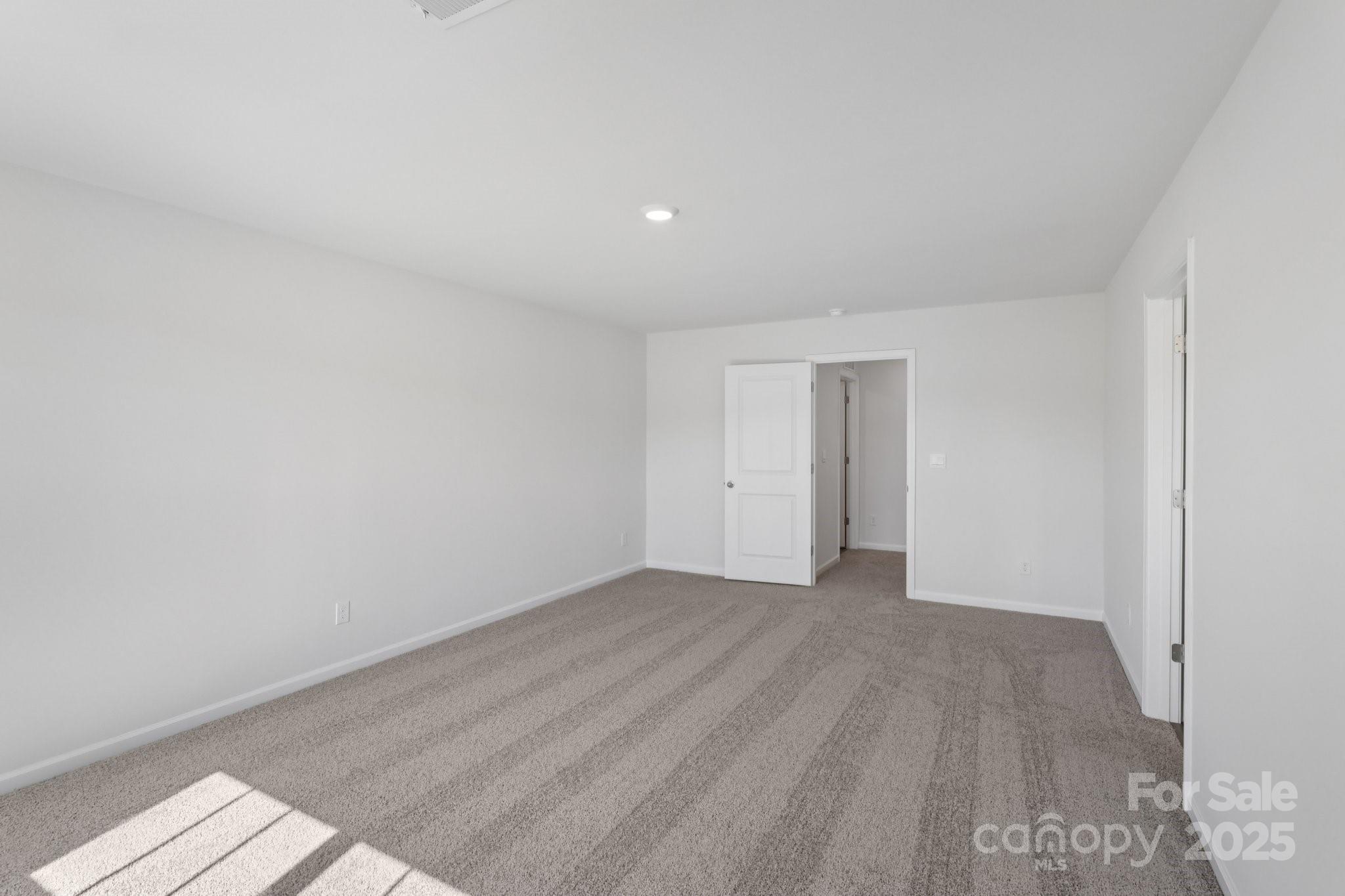 3964 Ashton Drive Northwest Conover, NC 28613 - Photo 31 of 44 a view of an empty room and wooden floor