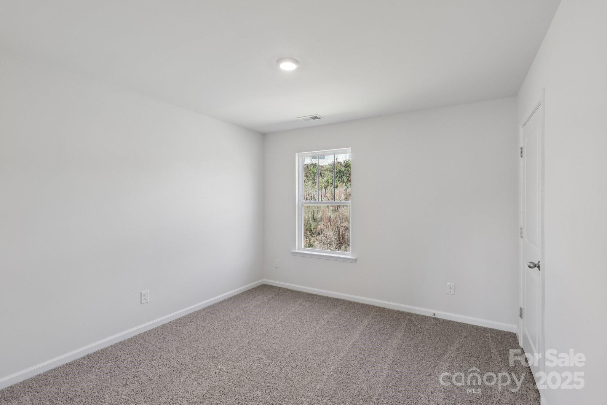 3964 Ashton Drive Northwest Conover, NC 28613 - Photo 34 of 44 an empty room with windows