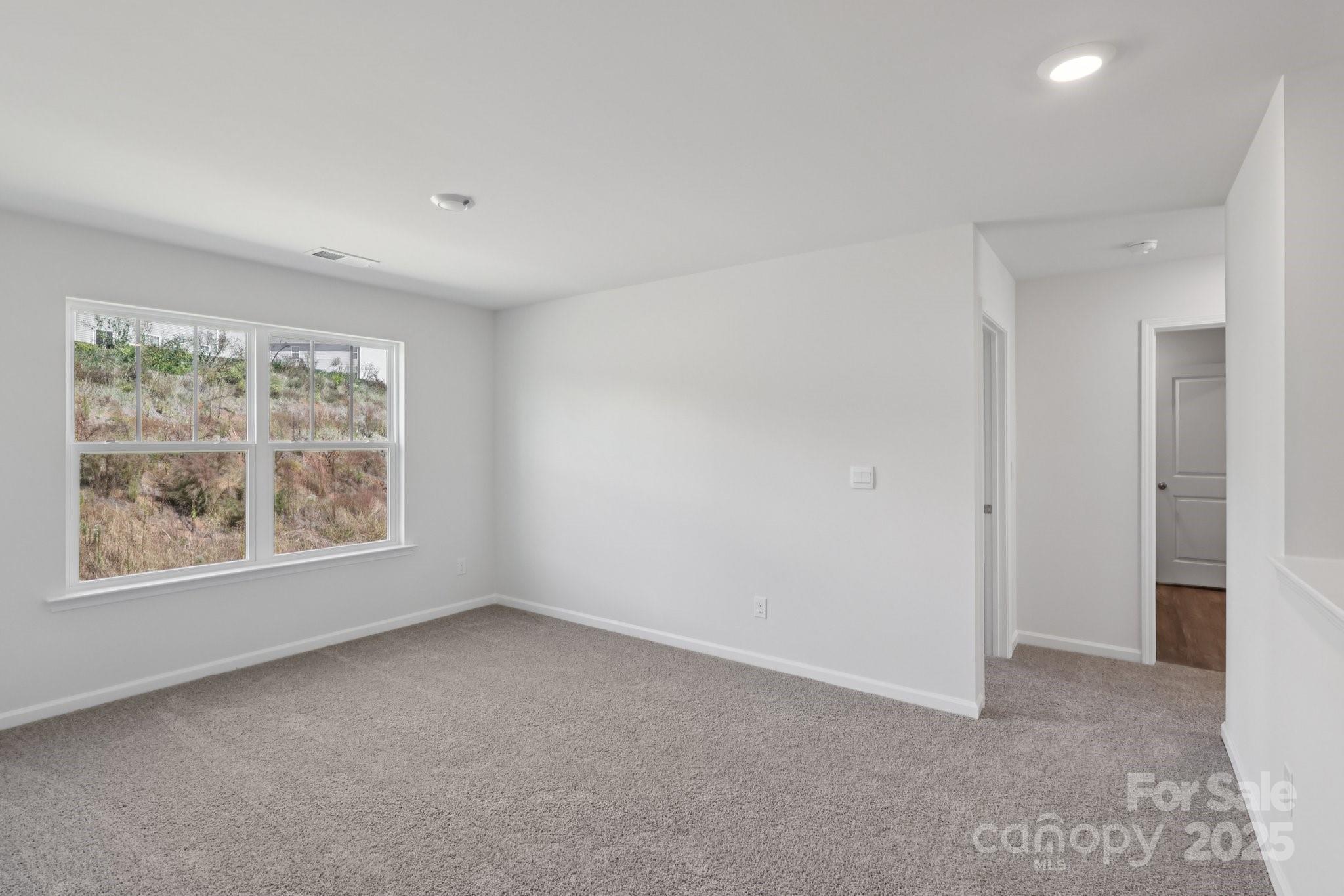 3964 Ashton Drive Northwest Conover, NC 28613 - Photo 36 of 44 a view of an empty room with a window