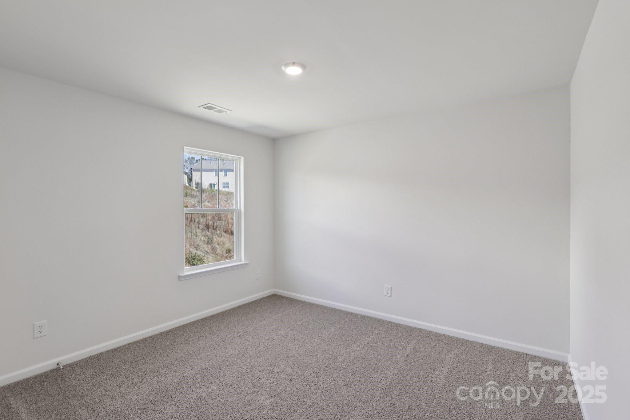 3964 Ashton Drive Northwest Conover, NC 28613 - Photo 38 of 44 an empty room with a window