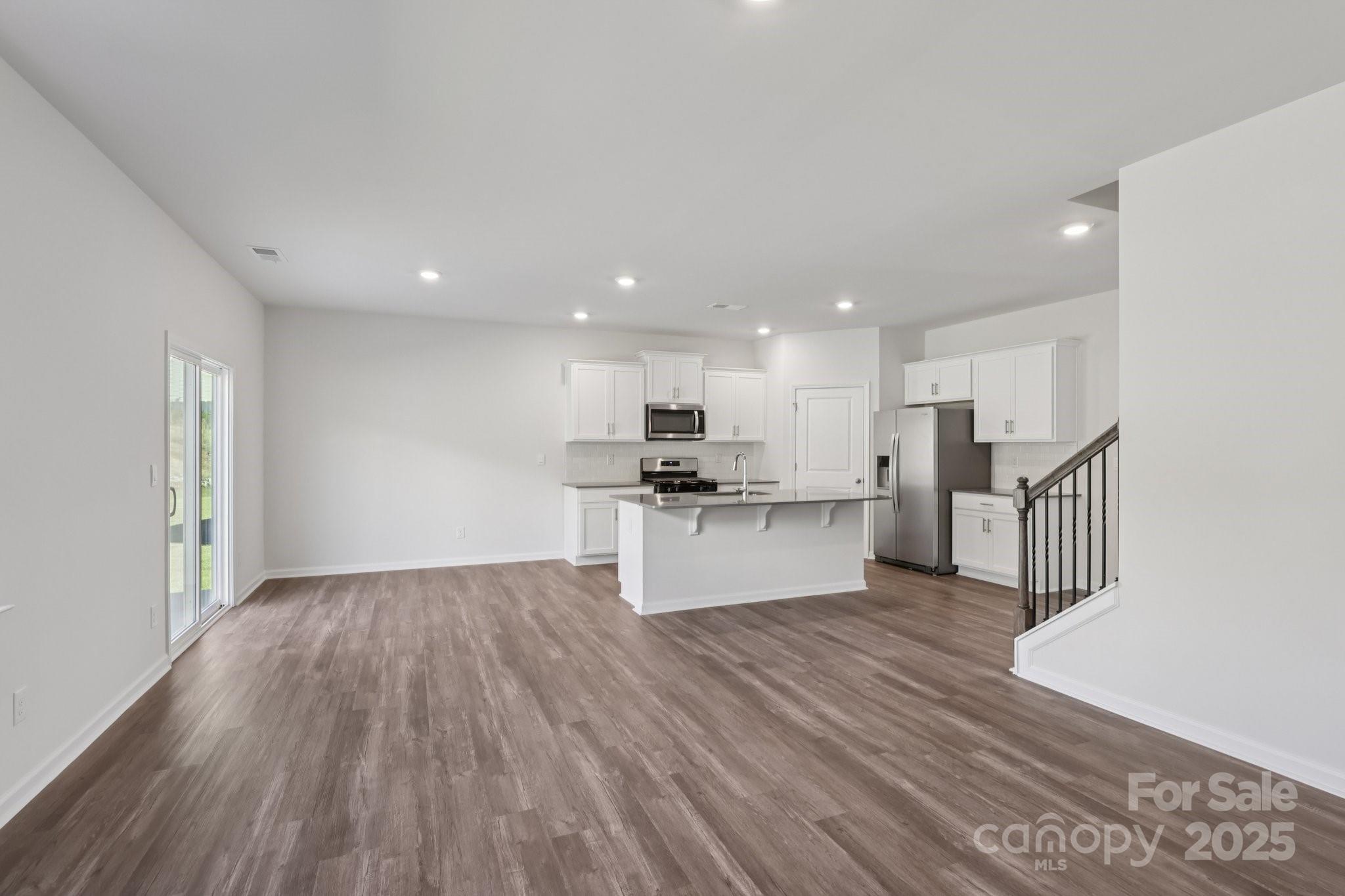 3964 Ashton Drive Northwest Conover, NC 28613 - Photo 10 of 44 a view of kitchen with wooden floor and electronic appliances
