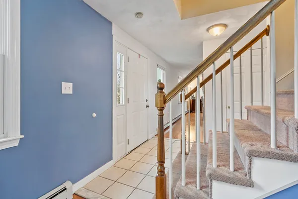 a view of an entryway with staircase
