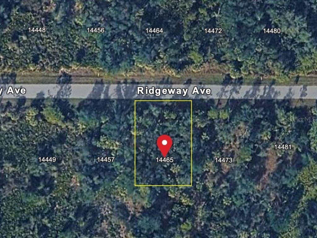 14465 Ridgeway Avenue Port Charlotte, FL 33953 - Photo 2 of 3 a view of a wooden house with a sign broad