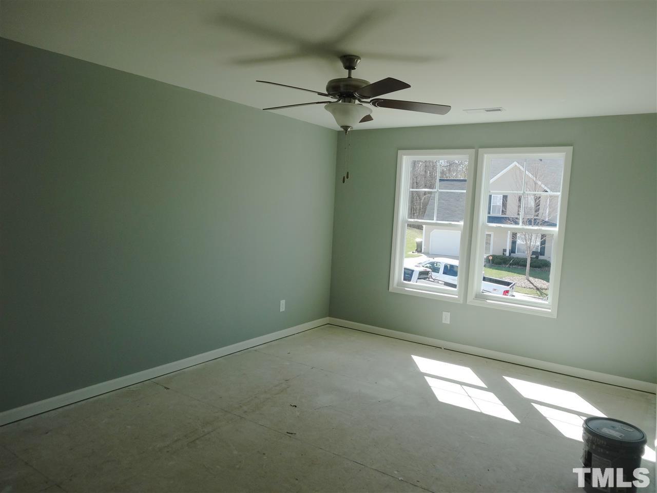 6832 Spanglers Spring Way Raleigh, NC 27610 - Photo 8 of 25 an empty room with a window