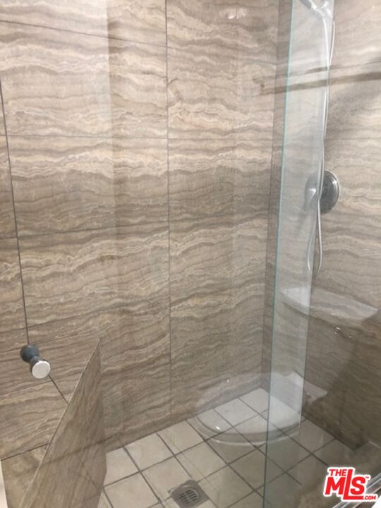 17153 Palisades Circle Pacific Palisades, CA 90272 - Photo 11 of 22 a bathroom with a shower