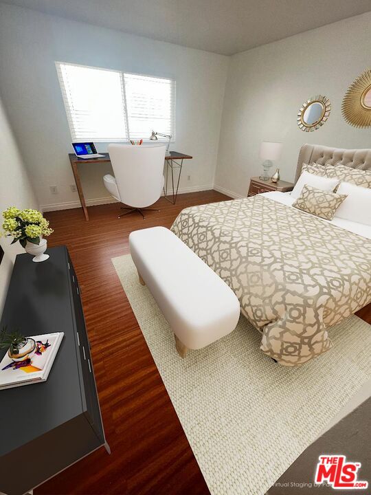 17153 Palisades Circle Pacific Palisades, CA 90272 - Photo 15 of 22 a living room with large couches and painting on the wall