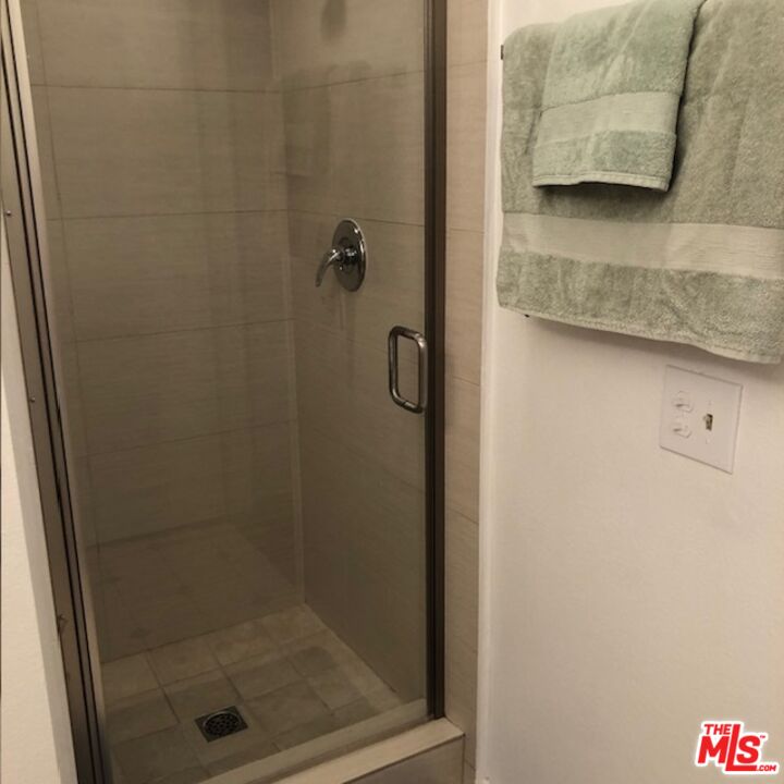 17153 Palisades Circle Pacific Palisades, CA 90272 - Photo 17 of 22 a bathroom with a shower