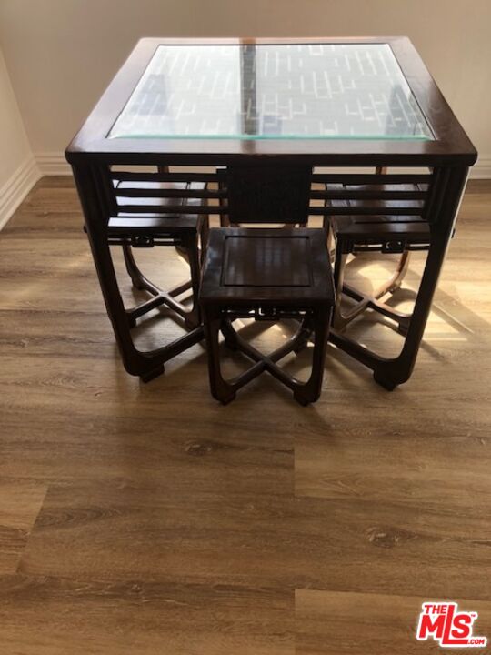 17153 Palisades Circle Pacific Palisades, CA 90272 - Photo 21 of 22 a living room with wooden floor