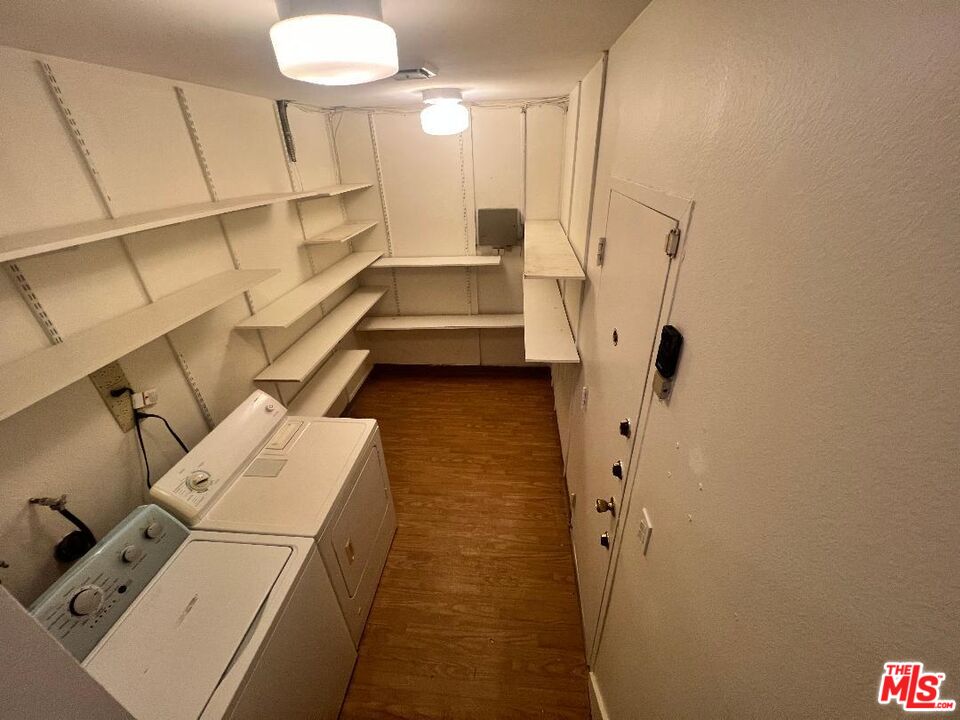 17153 Palisades Circle Pacific Palisades, CA 90272 - Photo 22 of 22 a bathroom with a sink a toilet and shower