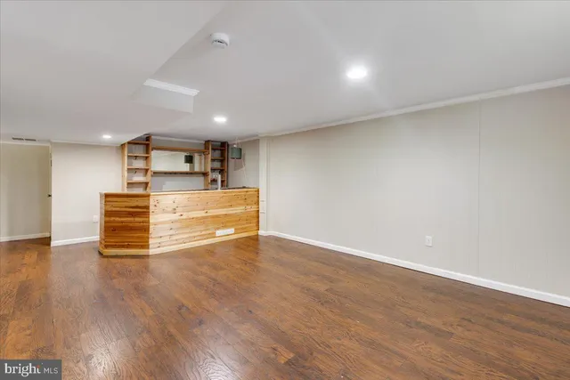 a view of a livingroom with wooden floor