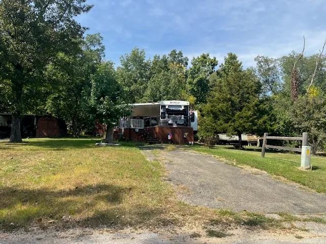 a view of a garage with parked cars