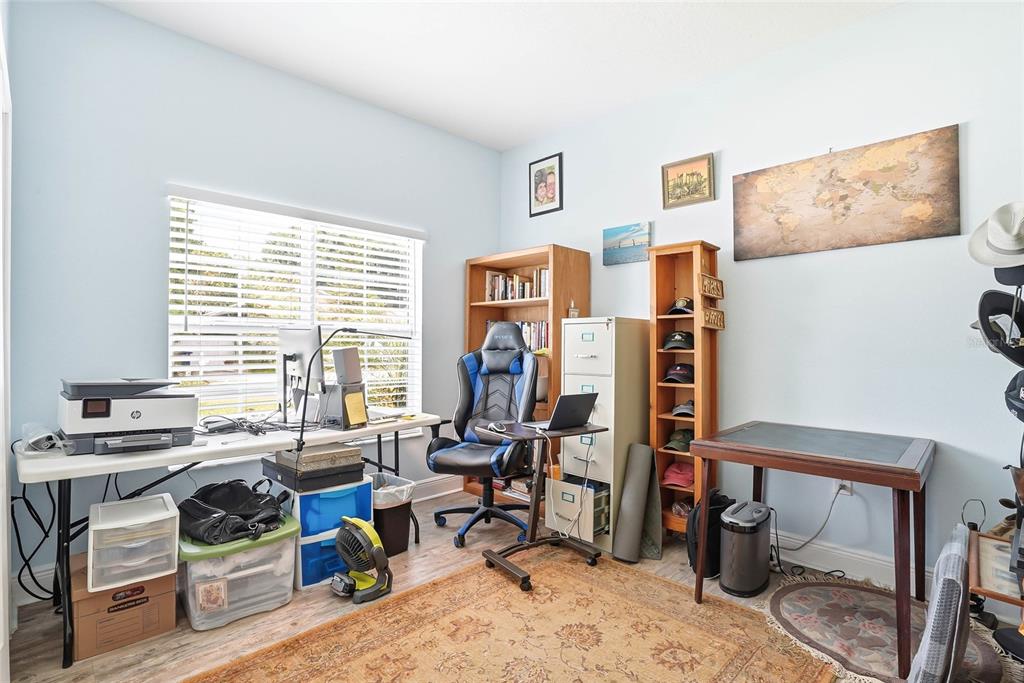 2906 West Douglas Street Tampa, FL 33607 - Photo 24 of 36 a view of a livingroom with workspace and a window