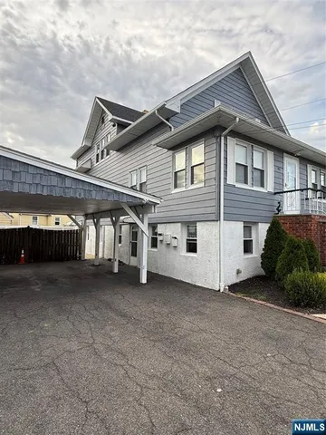 a view of a house with a garage